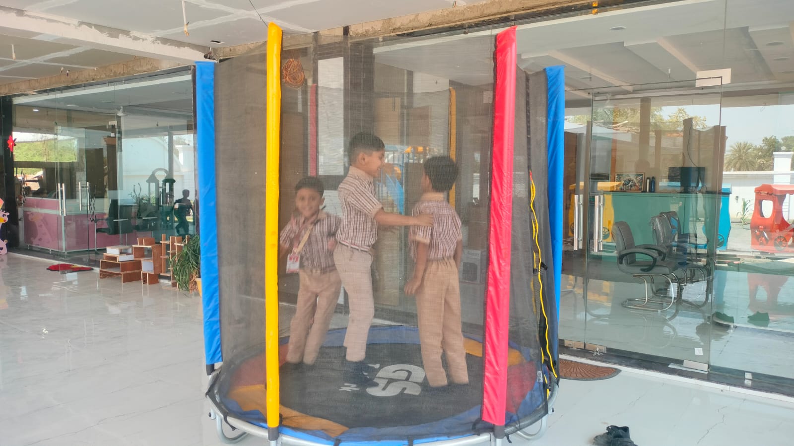 Children using trampoline