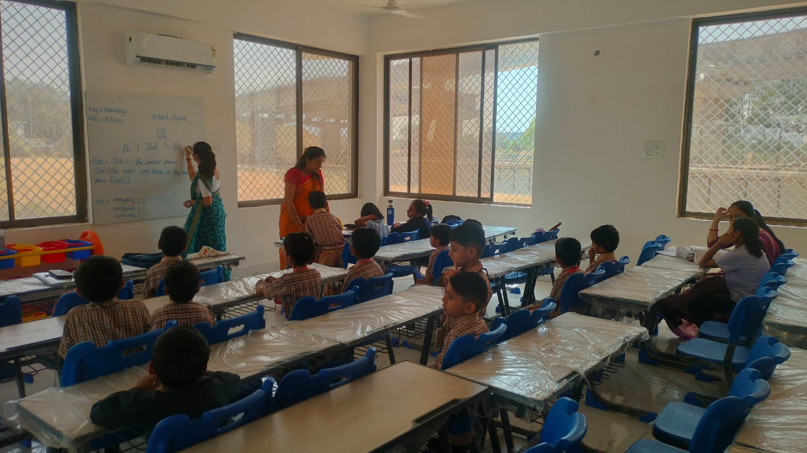 Students learning in a bright classroom