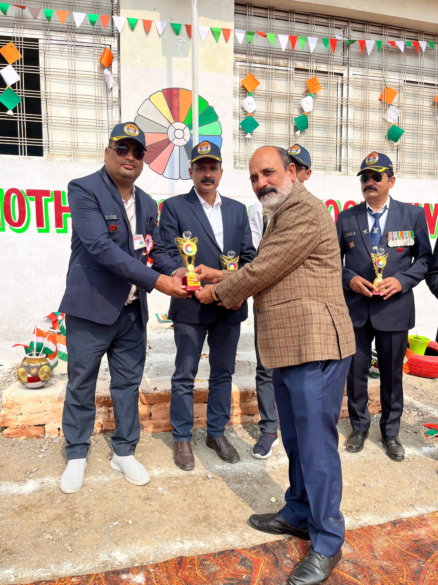 Guest receiving a trophy during prize distribution