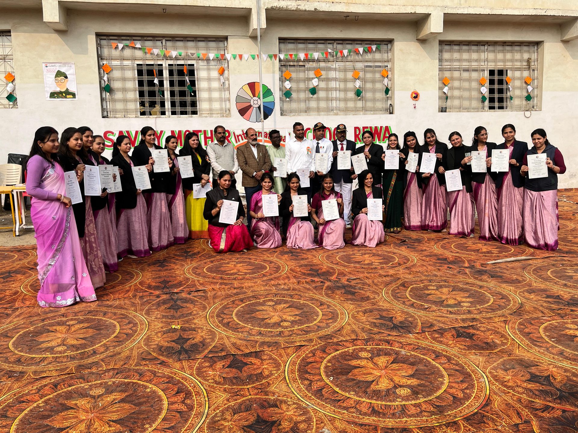 Faculty group photo after certificate recognition