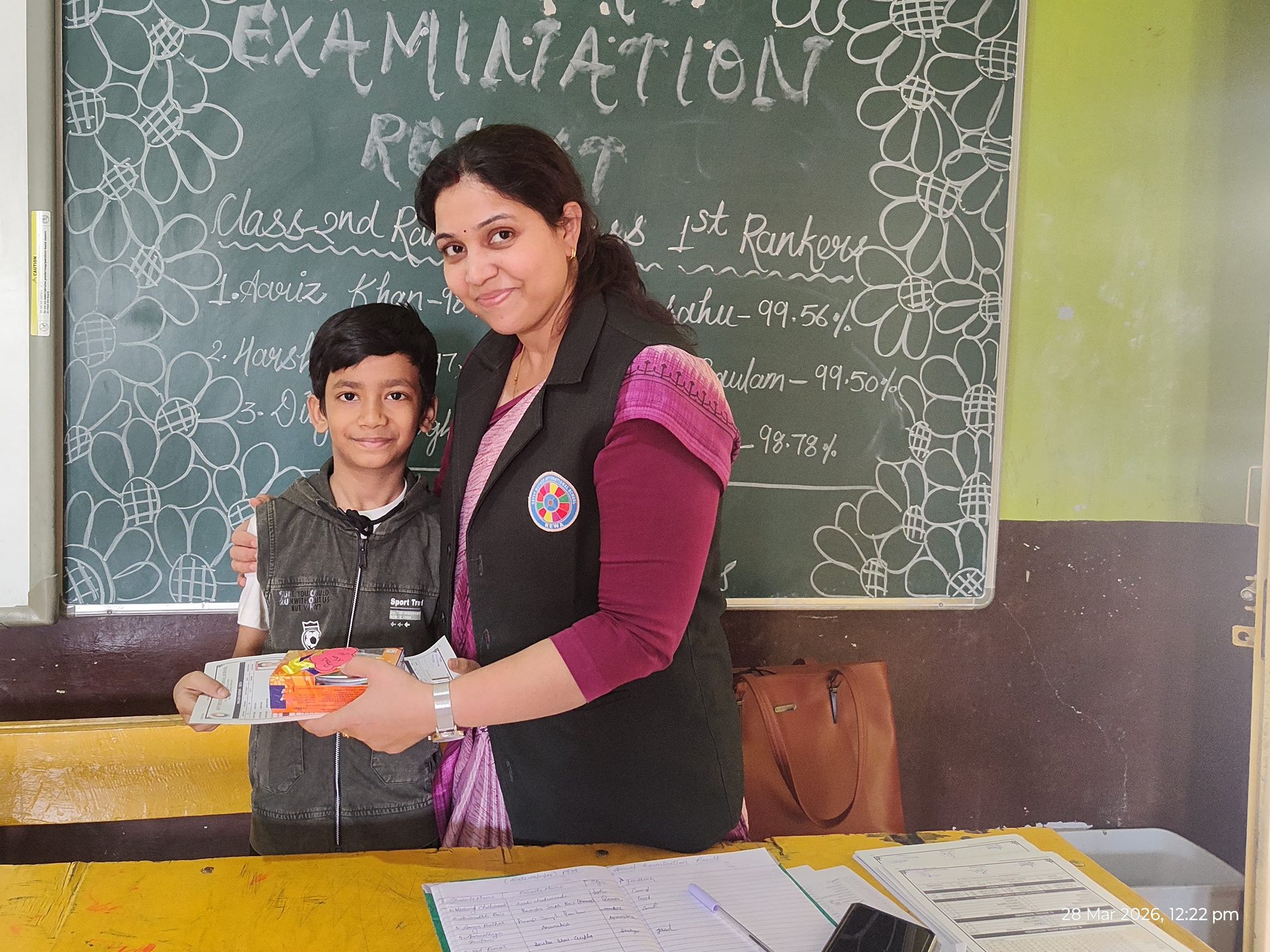 Teacher encouraging a student after class results