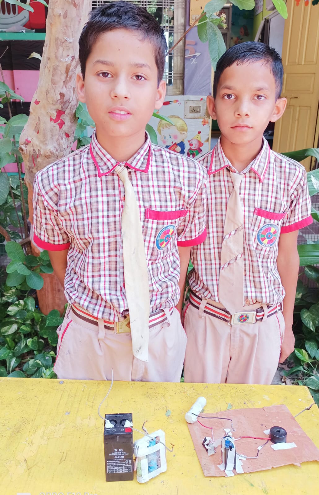 Students explaining a science activity with guidance